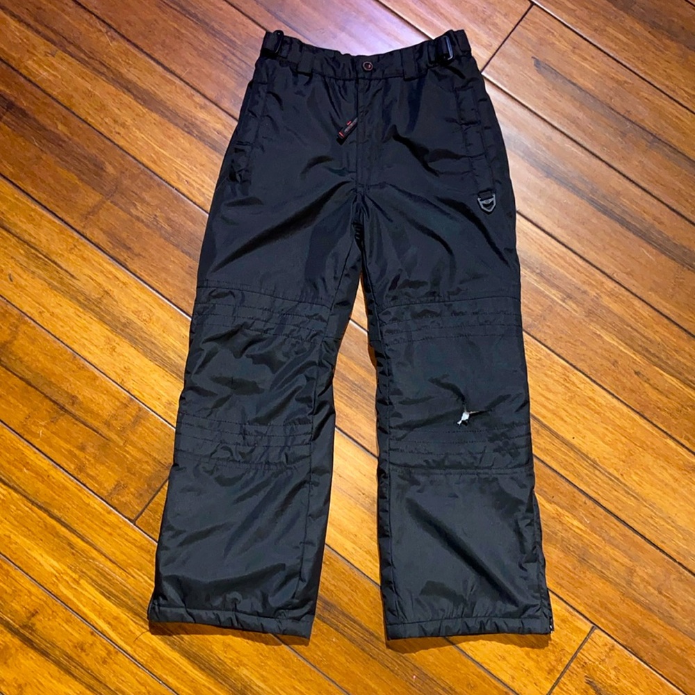 Protection System snow pants for a boy or a girl.